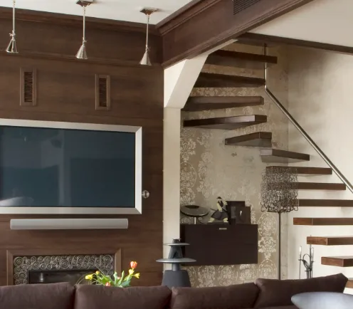Living room with wall mounted tv and celing lighting